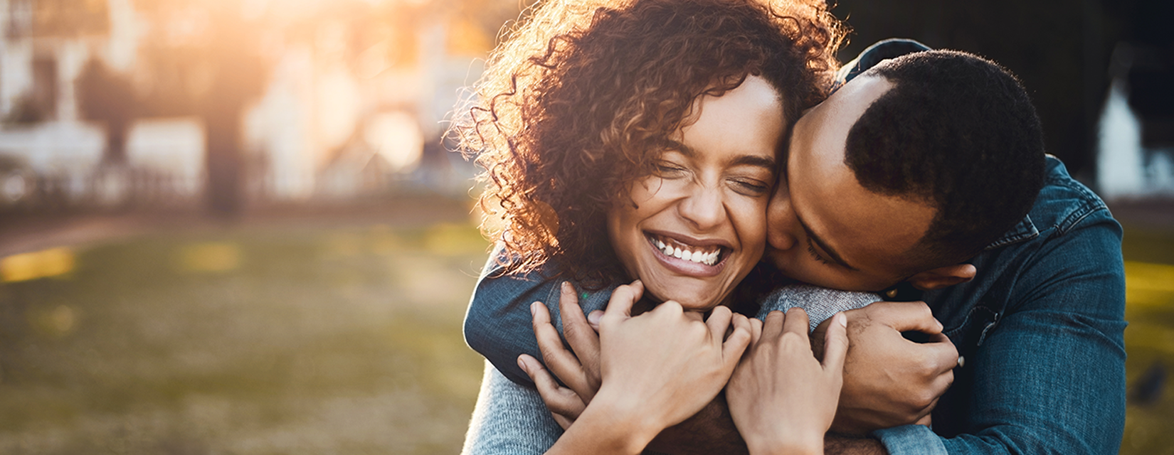 Couple hugging in the garden