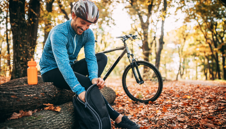 man-forest-bike