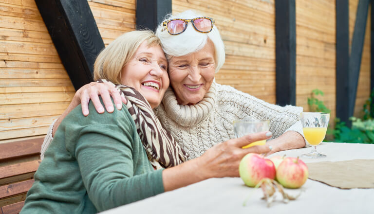Older ladies drinking together