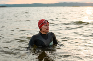Woman swimming in open water