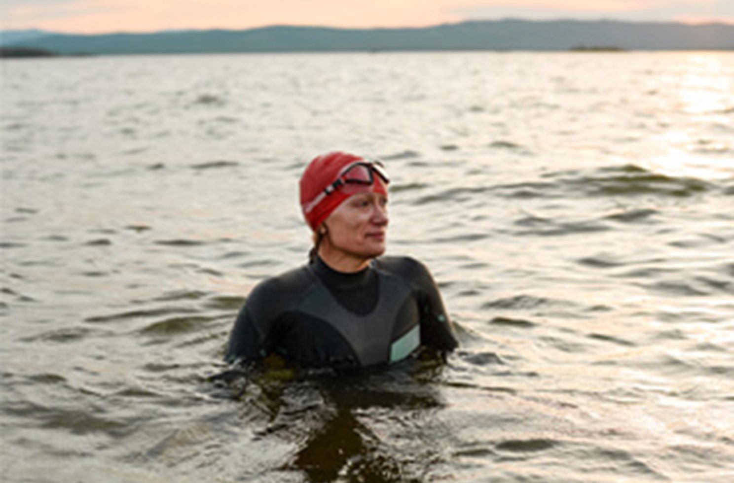 Woman swimming in open water