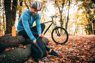 Man cycling in the forest