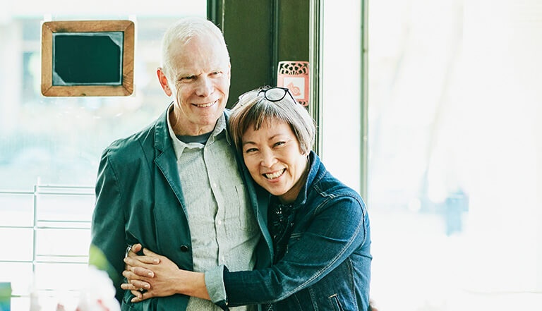 couple hugging at a shop