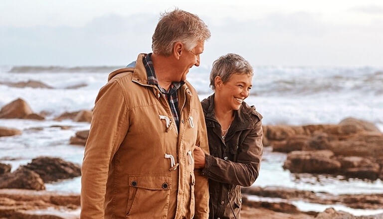 couple walking at the beach