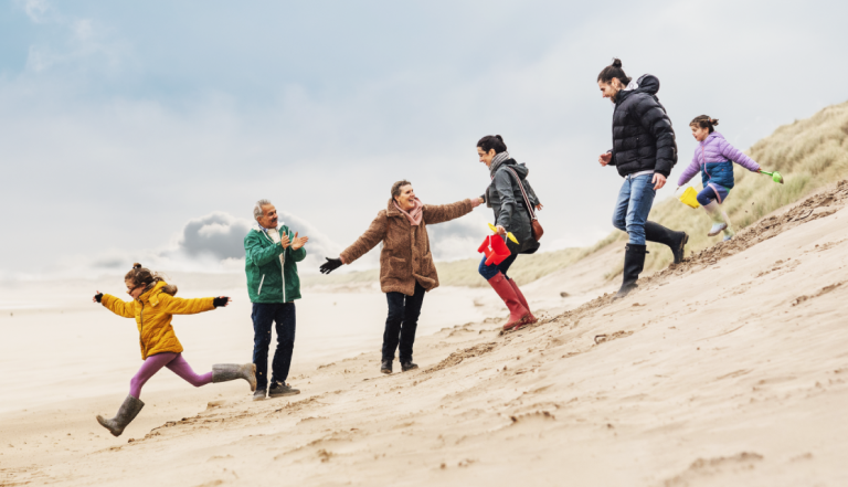 Family on sand dune